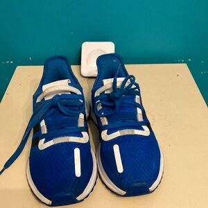 A pair of adidas youth size 5